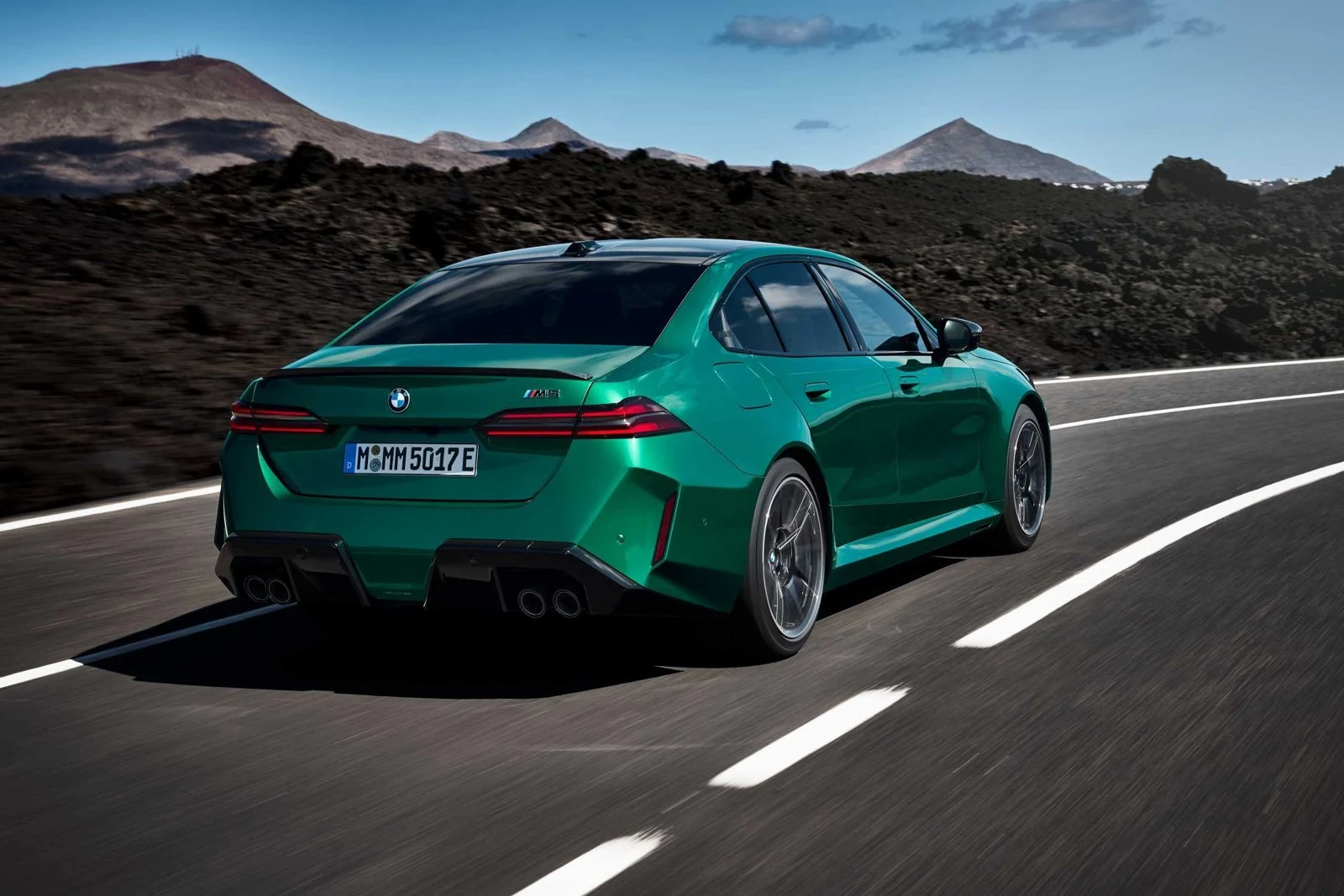 BMW M5 on an open mountain road
